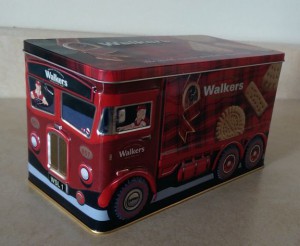 Cookie tin decorated like a delivery truck.