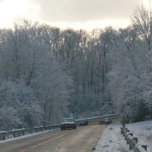 Three-way intersection with light snow.