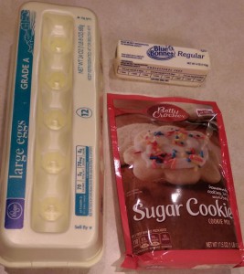 Sugar cookie mix, eggs, and a stick of margarine.