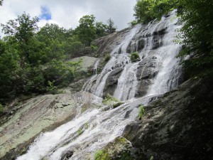 Waterfall over steep, slippery rocks.