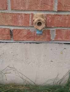 Spigot set into red bricks on the side of my house.