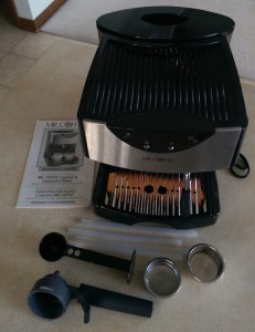 Espresso and cappuccino maker on kitchen countertop.