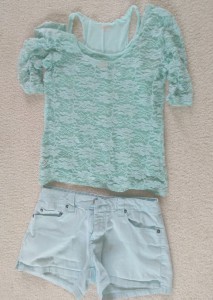 Light blue summer clothes set, with cotton shorts and a lace top layered over a tank top.