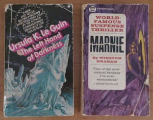 Two paperback novels, The Left Hand of Darkness and Marnie, on top of my bookshelf.