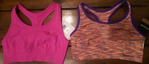 Two new sports bras with the tags still on.