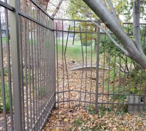 Aluminum fence broken by a deer.