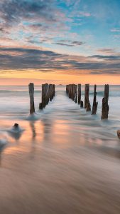 Beach photo with rising tide