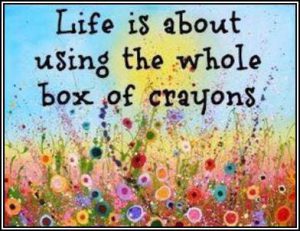 Colorful word-art that says "Life is about using the whole box of crayons."