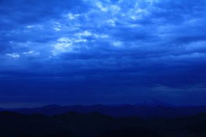 Blue night clouds in Oregon wilderness.