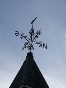 Weathervane showing the four directions.