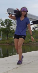 Meg Evans carrying boat at Melton Lake in Tennessee