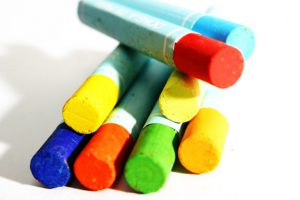 Photo of oil pastels in a stack.