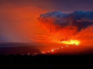 Photo of erupting Mauna Loa volcano at night.