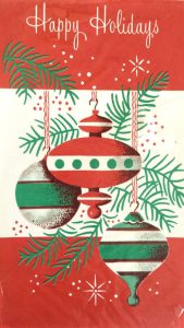 Happy Holidays image with ornaments and tree branches.