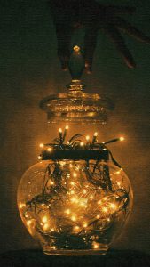 Picture of a jar filled with Christmas lights.