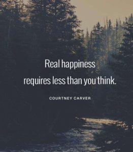 Word-art that says, "Real happiness requires less than you think." -Courtney Carver