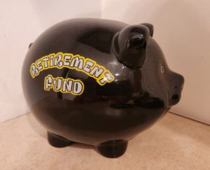 Photo of a piggy bank labeled "Retirement Fund."