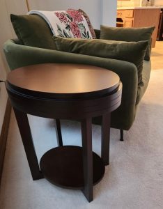 Photo of chair with end table.