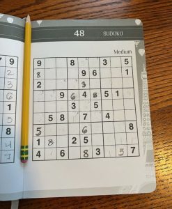 Photo of a Sudoku puzzle in progress.