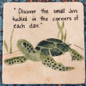 Word-art that says, "Discover the small joys tucked in the corners of each day."