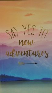 Word-art that says, "Say yes to new adventures."
