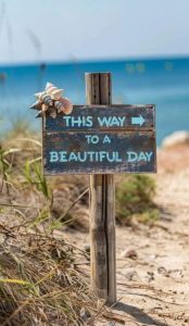 Word-art that says, "This way to a beautiful day."